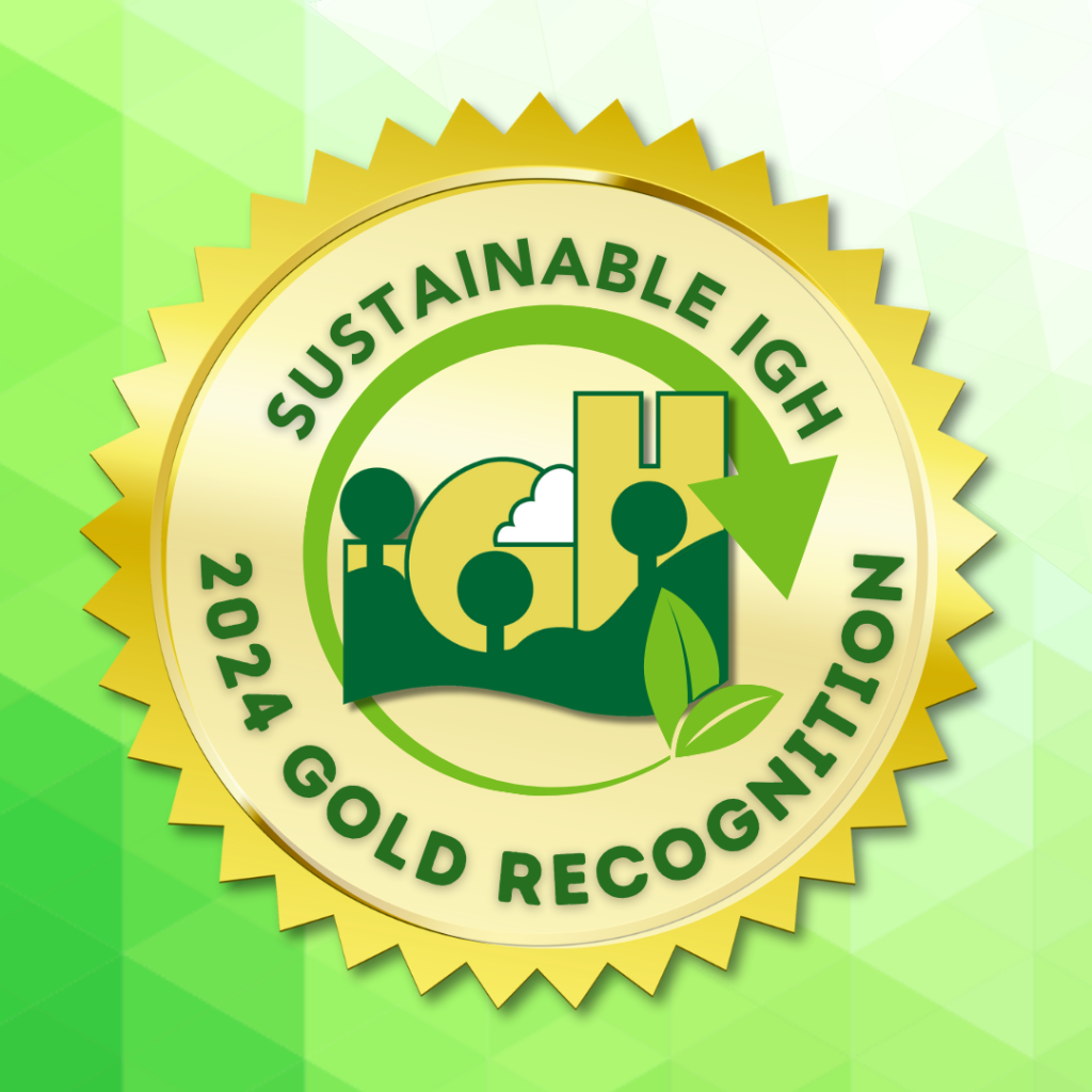 2024 Gold Recognition badge for Sustainable IGH featuring a green landscape with buildings and trees, accented by a beautiful gold border. - OYESPA Aveda Lifestyle | nver Grove Heights, MN